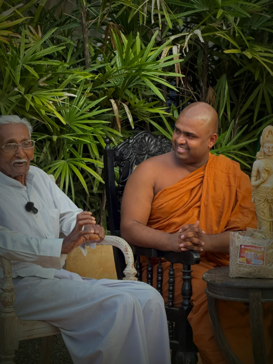 The founder of Siri Suwa Arana seated with the traditional physician